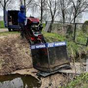 Boomstronk verwijderen in een talud in Rhoon
