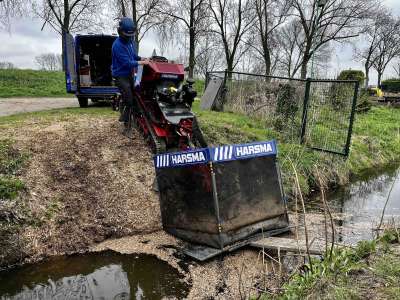 Boomstronk verwijderen in een talud in Rhoon